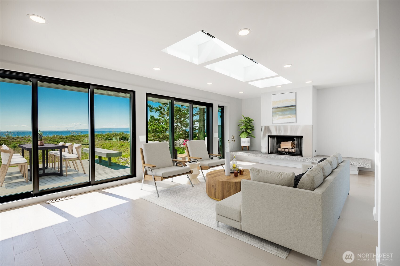 1613 Edwards Drive Point Roberts, WA 98281 - Photo 13 of 38 a living room with furniture large windows and a flat screen tv