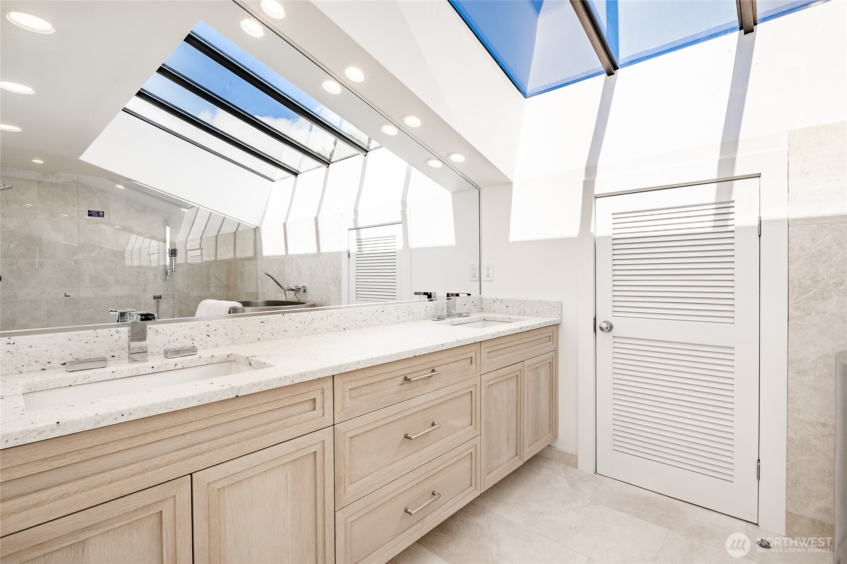 1613 Edwards Drive Point Roberts, WA 98281 - Photo 27 of 38 a bathroom with a double vanity sink and a mirror