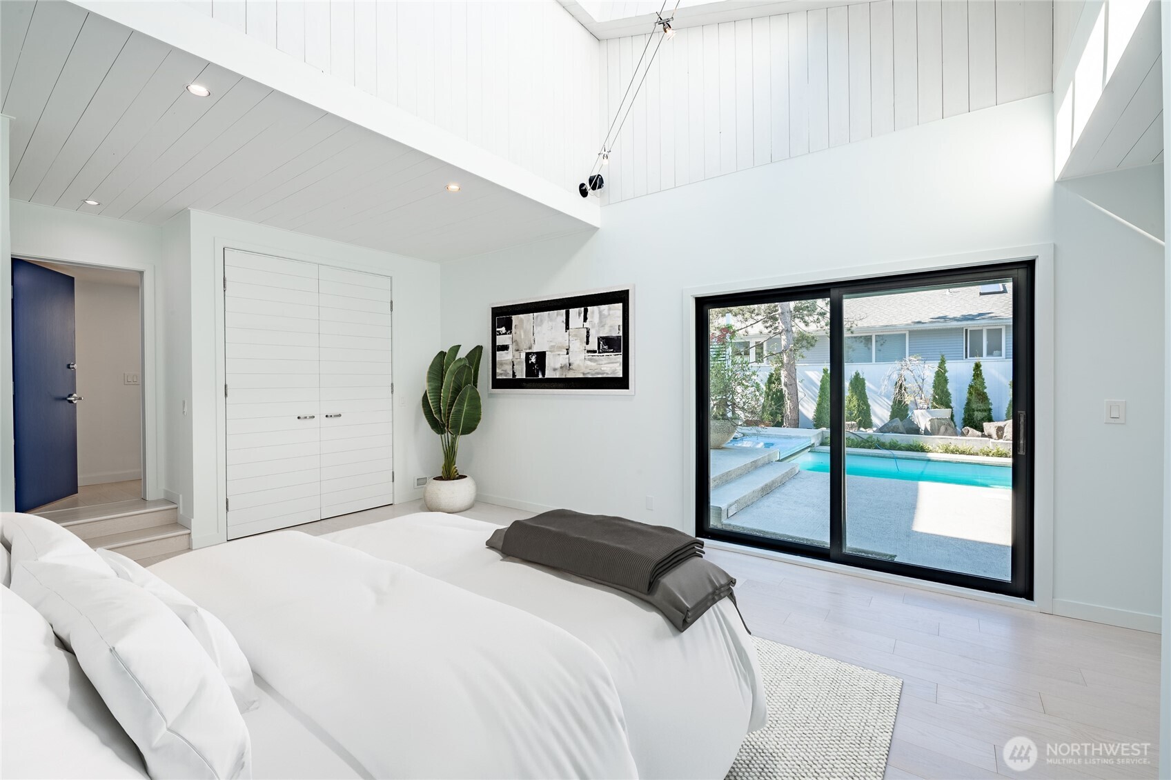 1613 Edwards Drive Point Roberts, WA 98281 - Photo 29 of 38 a bedroom with a large bed and a window