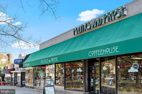 a view of street with shops