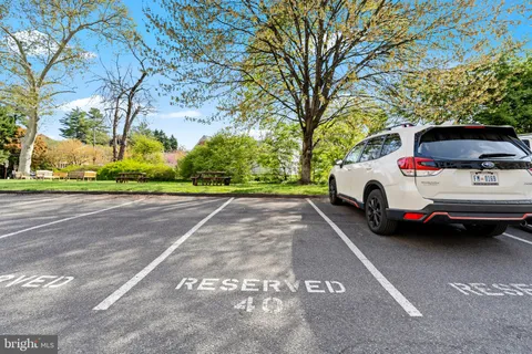 a view of street with parked cars