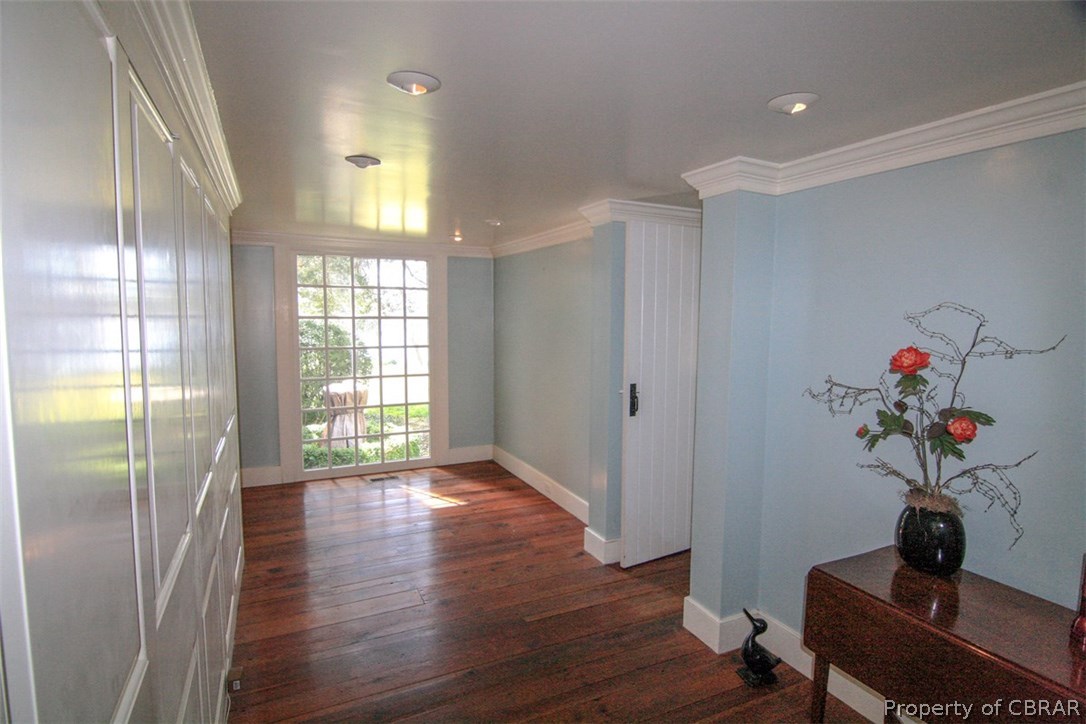 4553 Merry Point Road Lancaster, VA 22503 - Photo 18 of 41 Entrance - An inviting entrance with panel led wall of closets.