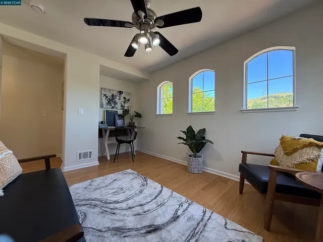 a bedroom with bed and a couch