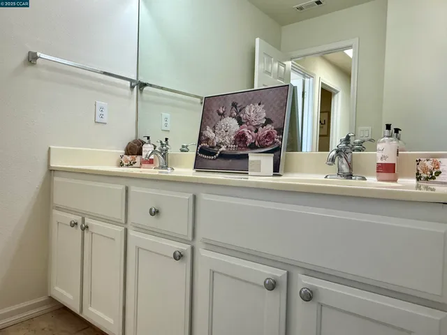 a view of a lake with couches and city view