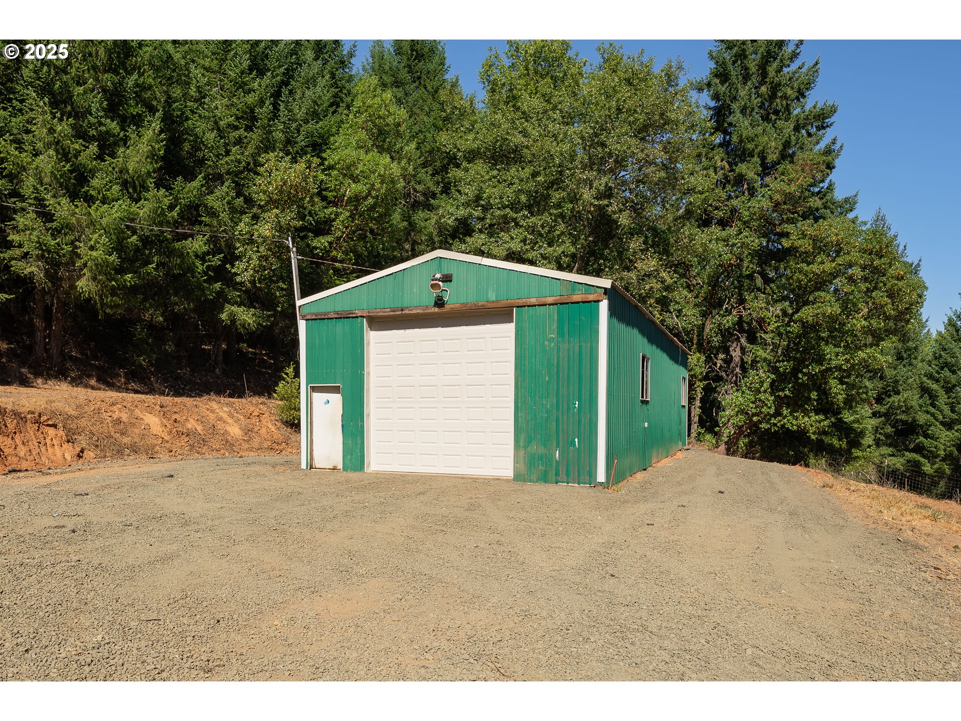 281 Callahan Road Roseburg, OR 97471 - Photo 25 of 39 a front view of a house with a yard