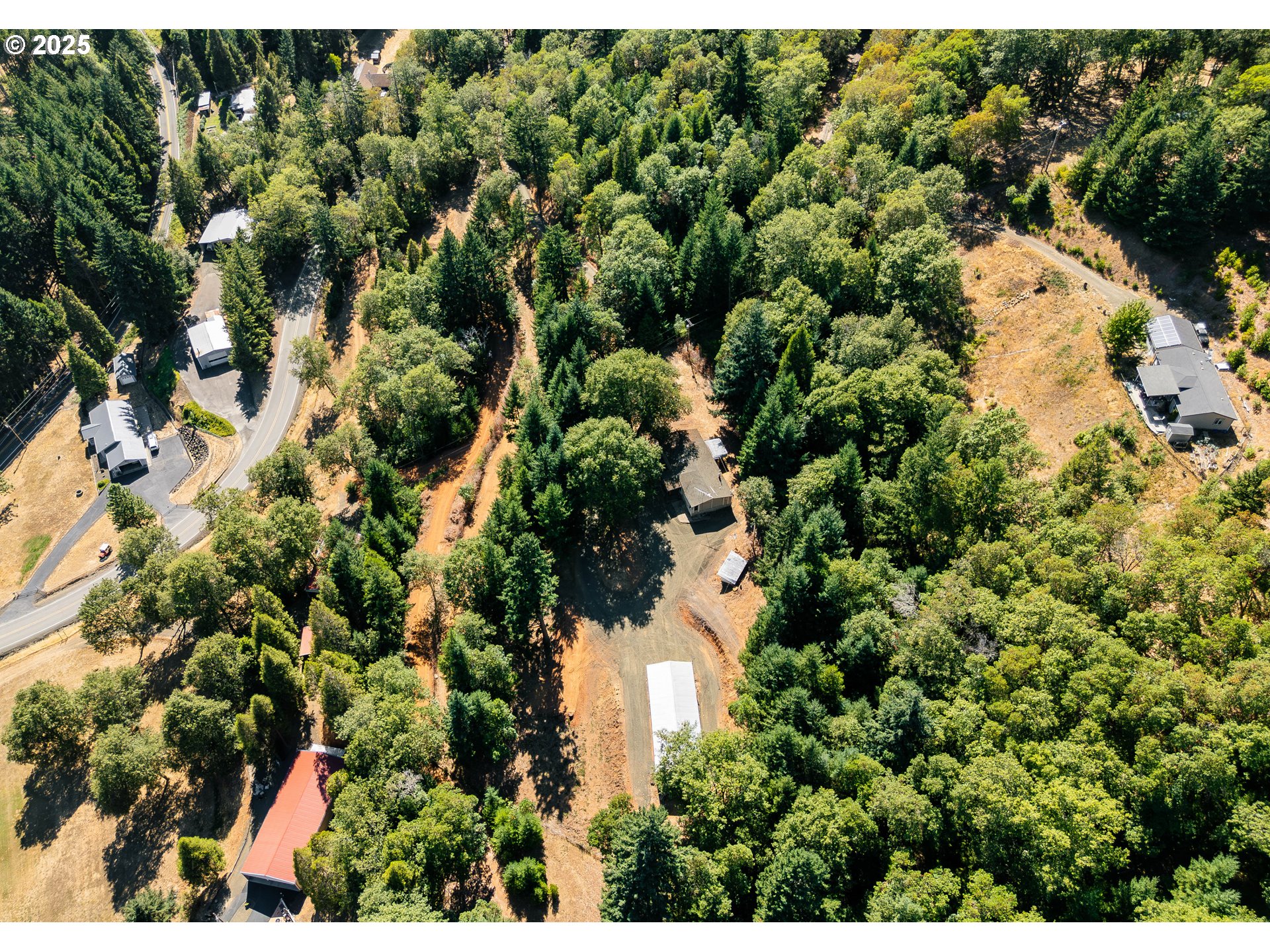 281 Callahan Road Roseburg, OR 97471 - Photo 3 of 39 a view of a bunch of trees