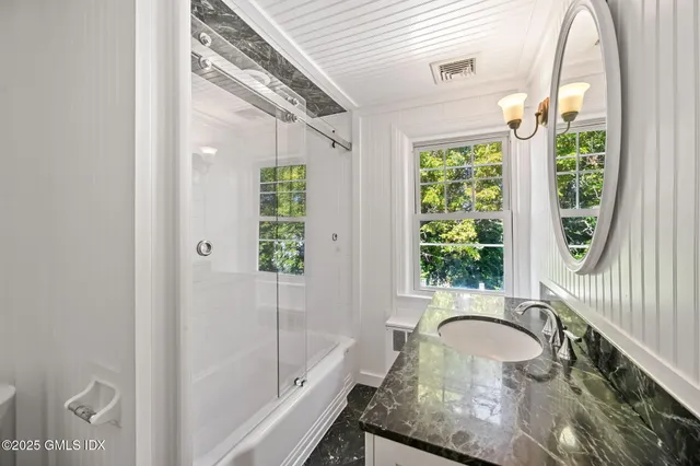 a view of entryway with stairs