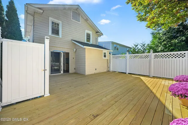 a view of backyard with green space