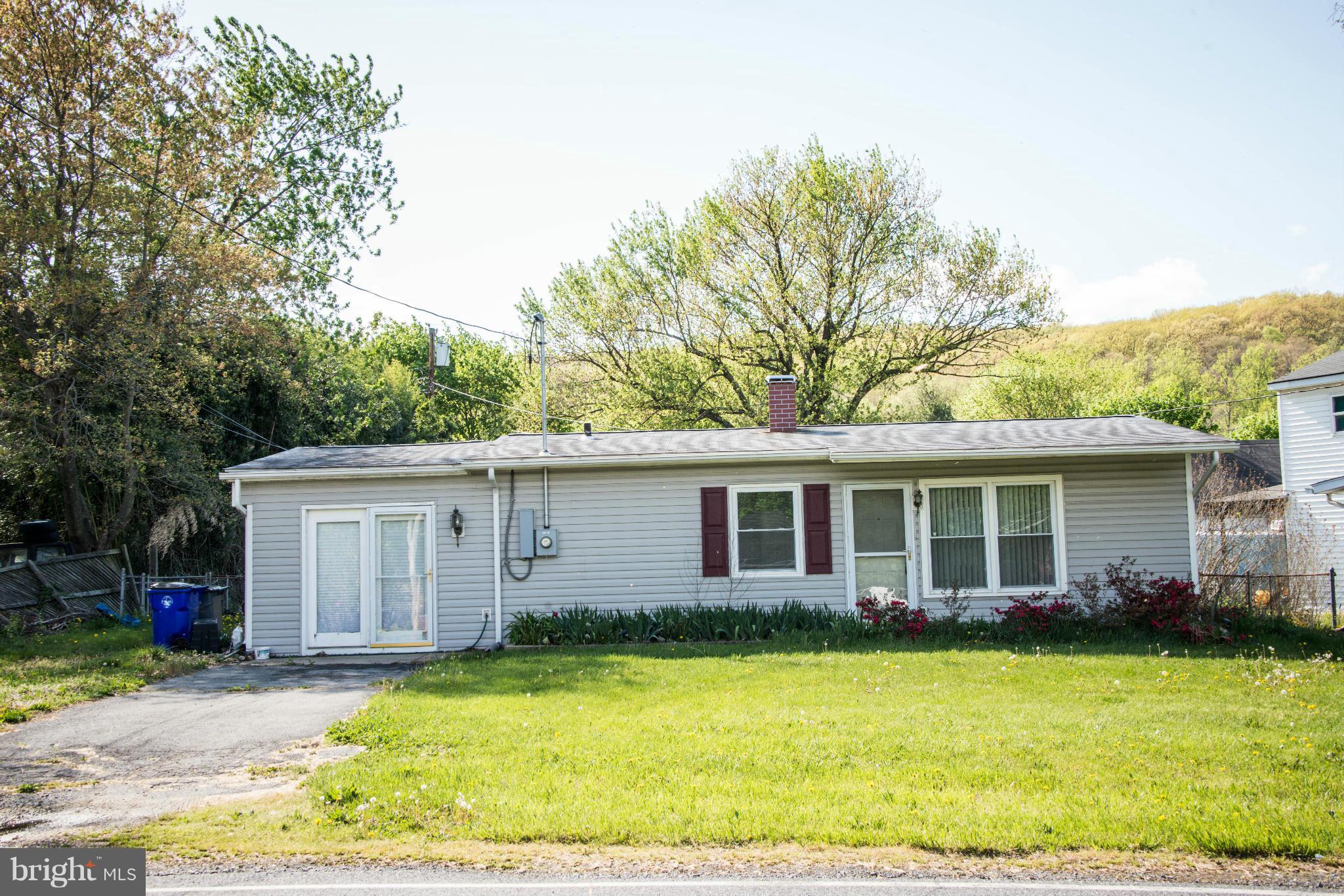 9306 Bethel Road Frederick, MD 21702 - Photo 1 of 19 a view of a house with a swimming pool