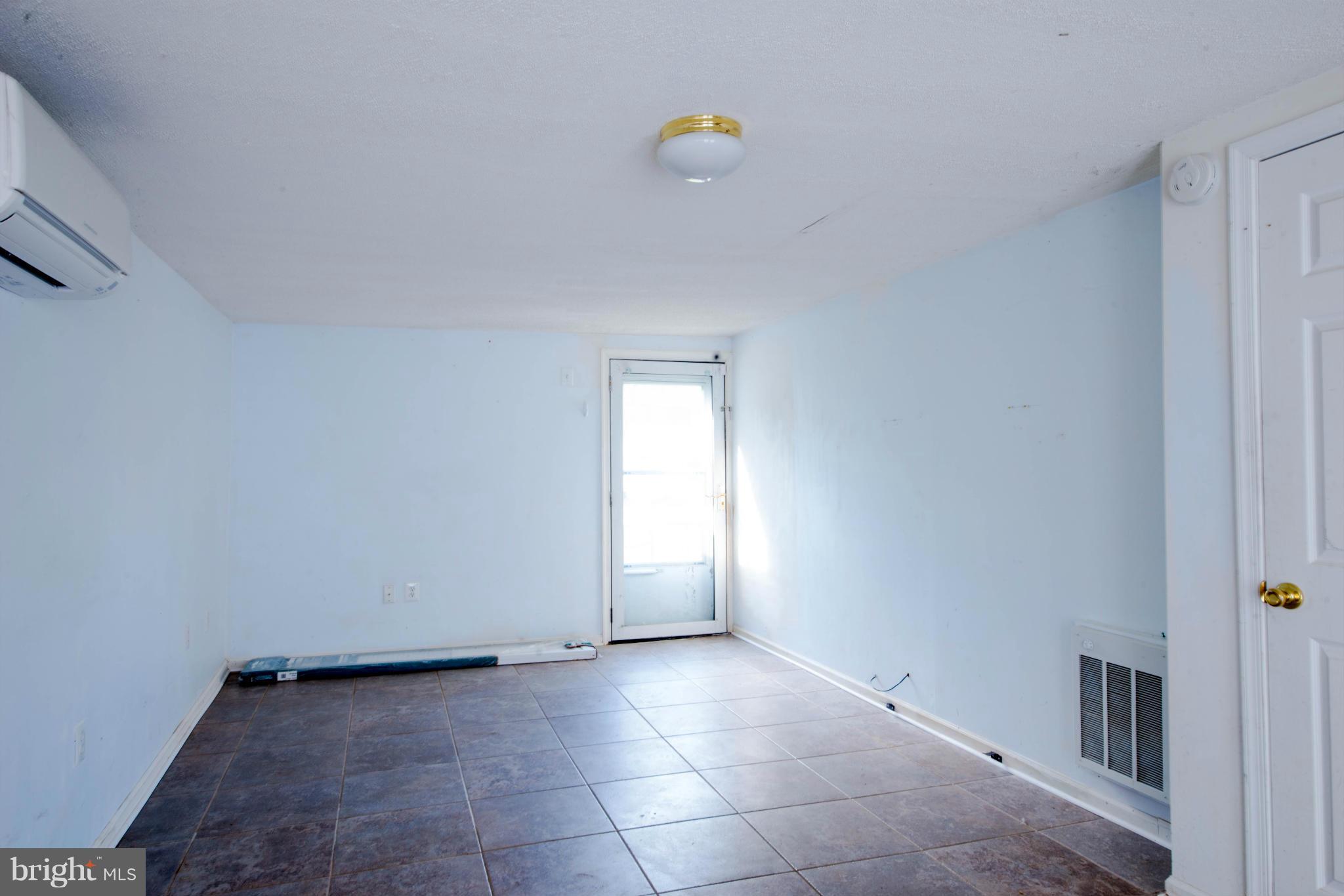 9306 Bethel Road Frederick, MD 21702 - Photo 12 of 19 a view of an empty room and window