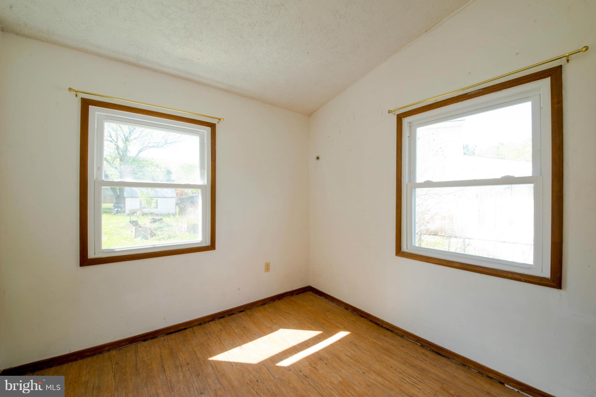 9306 Bethel Road Frederick, MD 21702 - Photo 13 of 19 a view of an empty room with a window