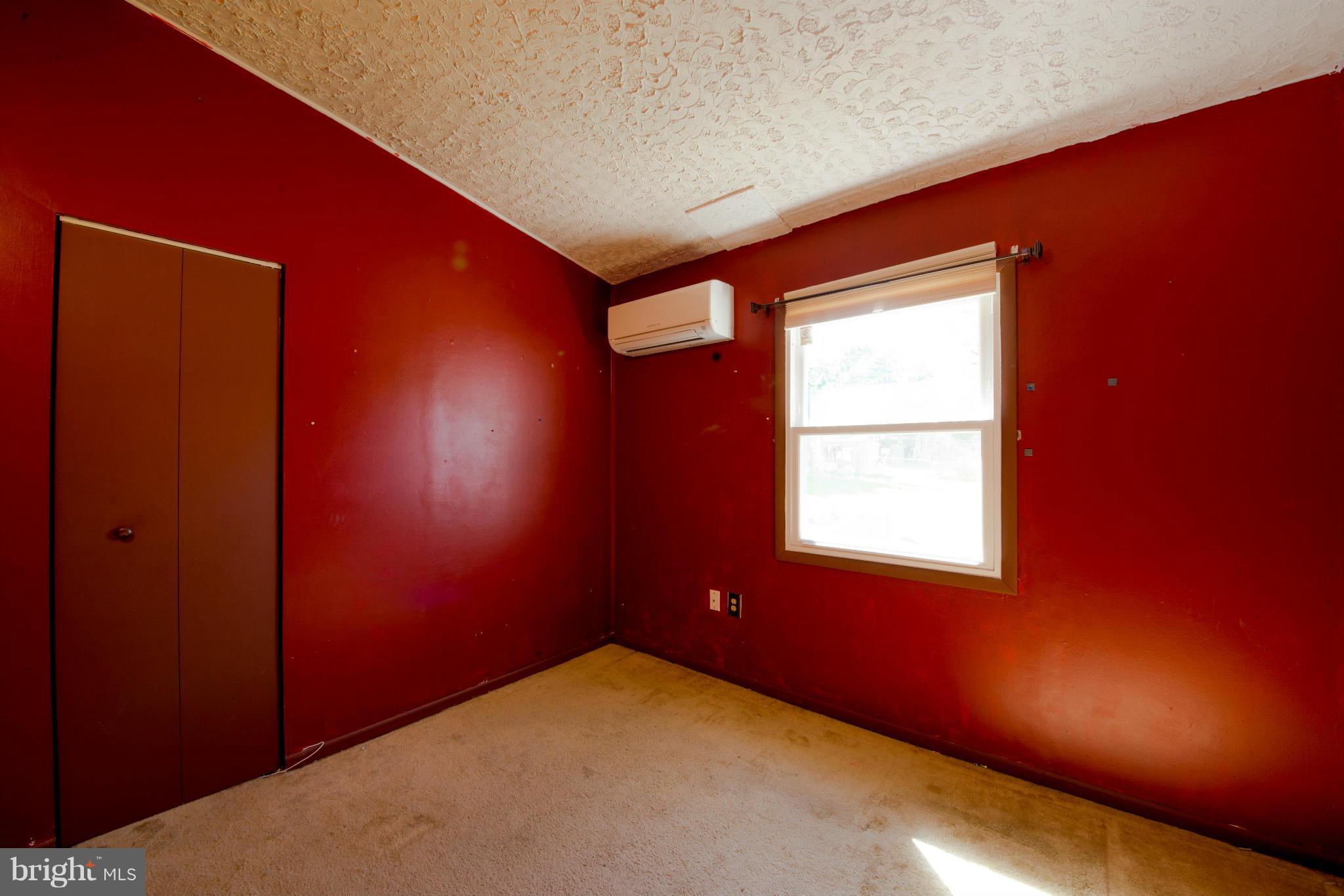 9306 Bethel Road Frederick, MD 21702 - Photo 14 of 19 an empty room with a window