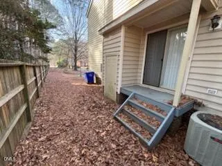a view of a back yard of the house