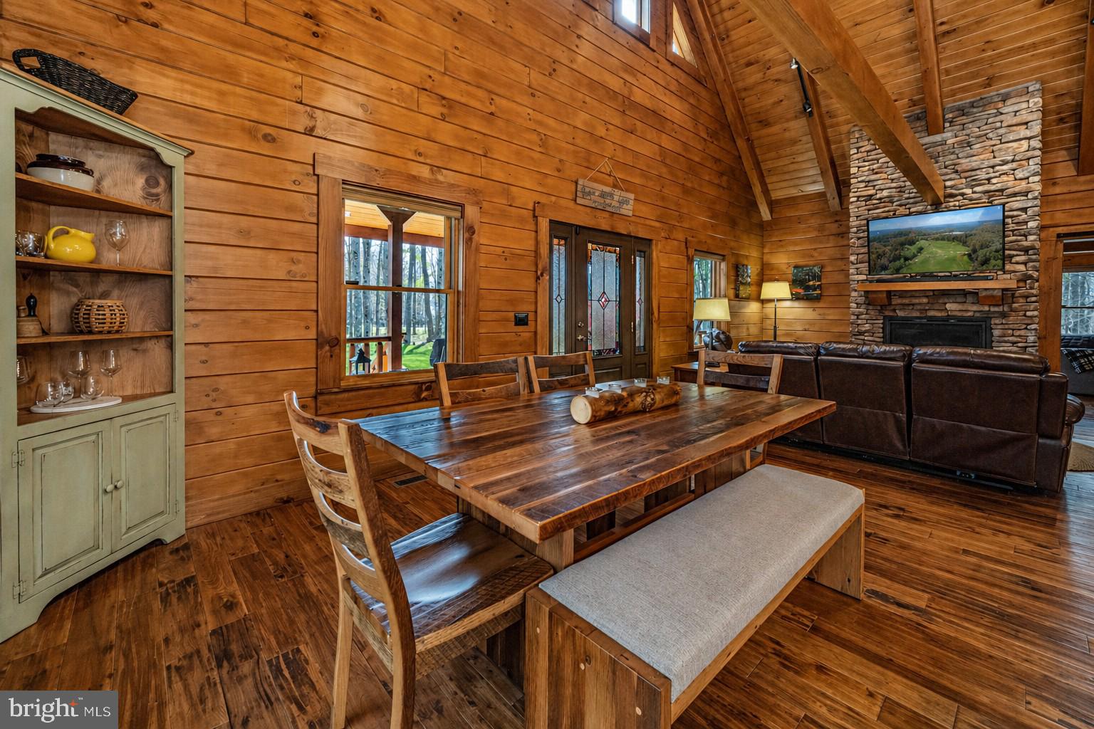 75 Fern Loop Oakland, MD 21550 - Photo 6 of 75 a view of a chairs and table on the wooden floor