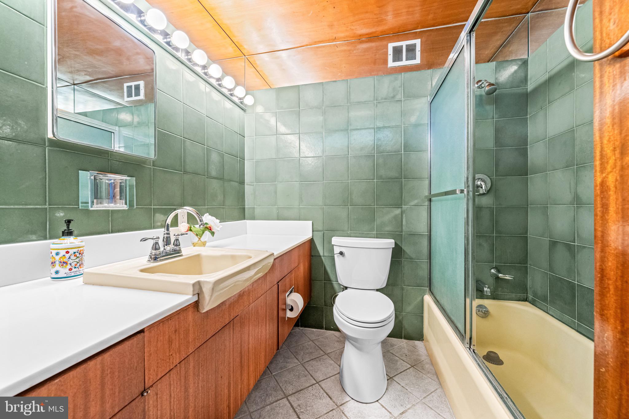 708 Righters Mill Road Penn Valley, PA 19004 - Photo 38 of 77 a bathroom with a sink a toilet and shower