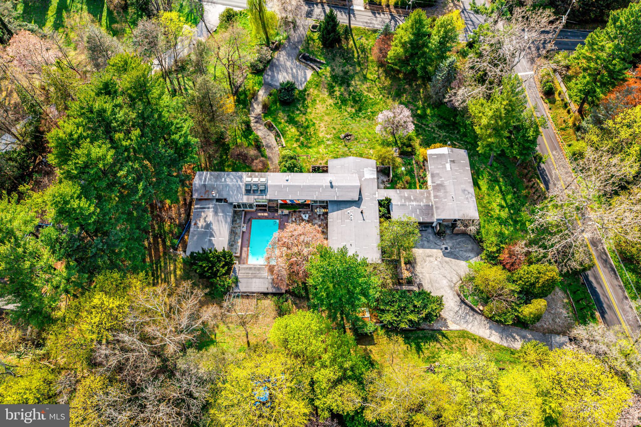 708 Righters Mill Road Penn Valley, PA 19004 - Photo 74 of 77 an aerial view of a house with a yard basket ball court and outdoor seating