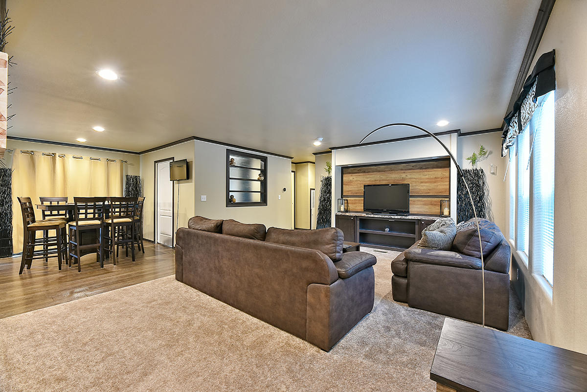 1011 Ferry Road Grants Pass, OR 97526 - Photo 3 of 21 a living room with furniture and a flat screen tv