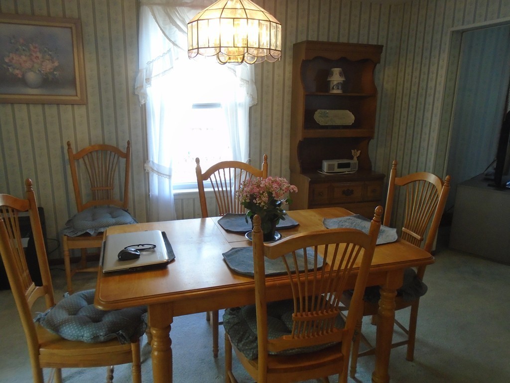 33 Chesterfield Road Worcester, MA 01602 - Photo 8 of 29 a view of a dining room with furniture and window