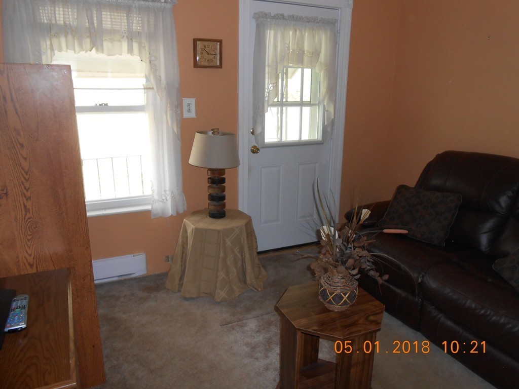 33 Chesterfield Road Worcester, MA 01602 - Photo 10 of 29 a living room with furniture and a window