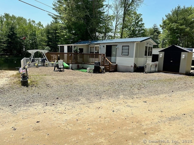 8 S Road, Unit W86 Stafford, CT 06076 - Photo 11 of 20 a view of a house with backyard