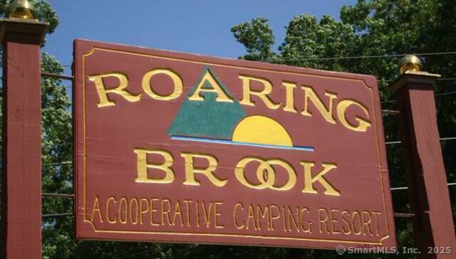 8 S Road, Unit W86 Stafford, CT 06076 - Photo 20 of 20 a street sign that is on a wall