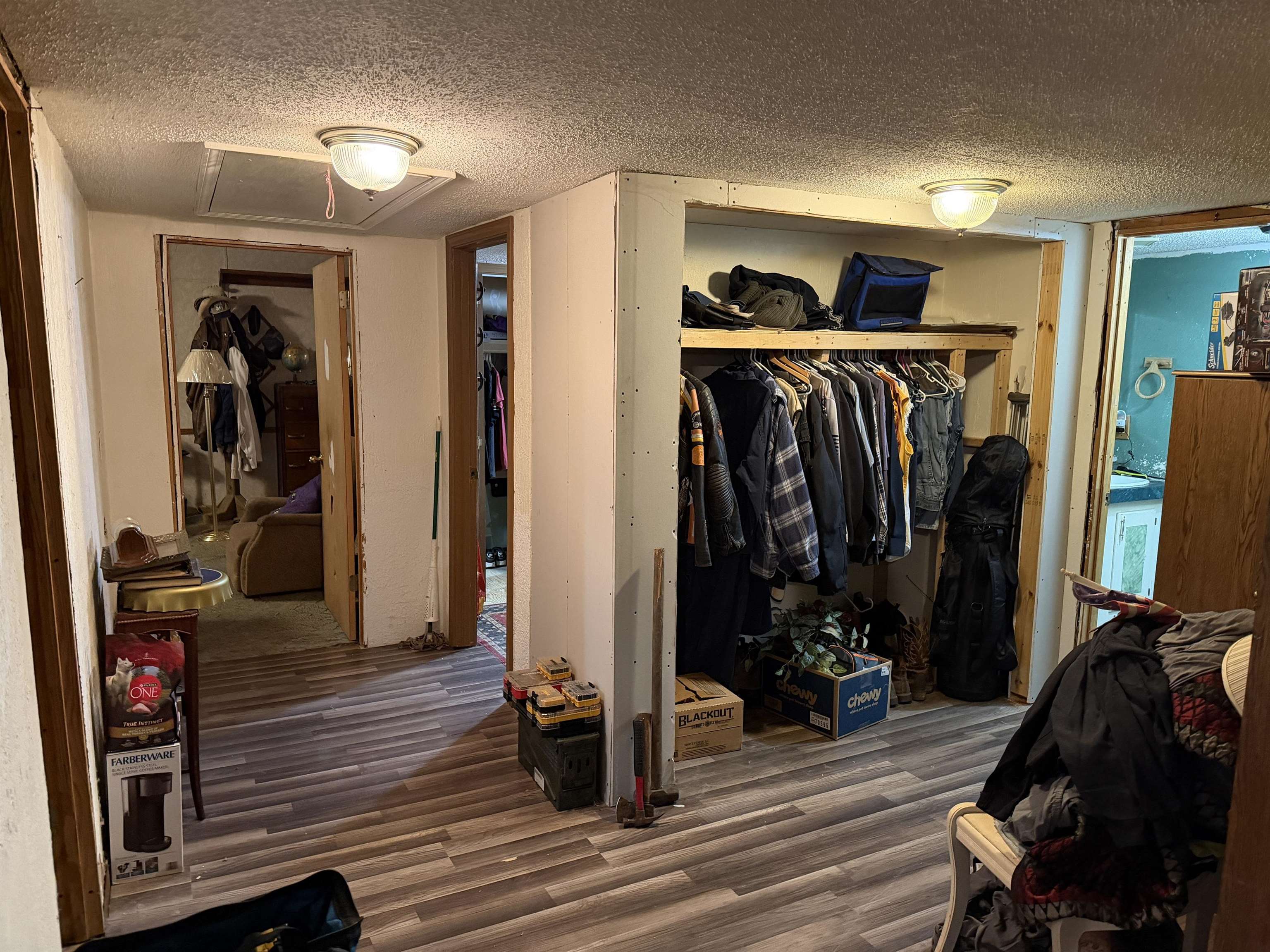 5085 Hardin Graveyard Road Enville, TN 38332 - Photo 11 of 40 a view of walk in closet with clothes and shoes