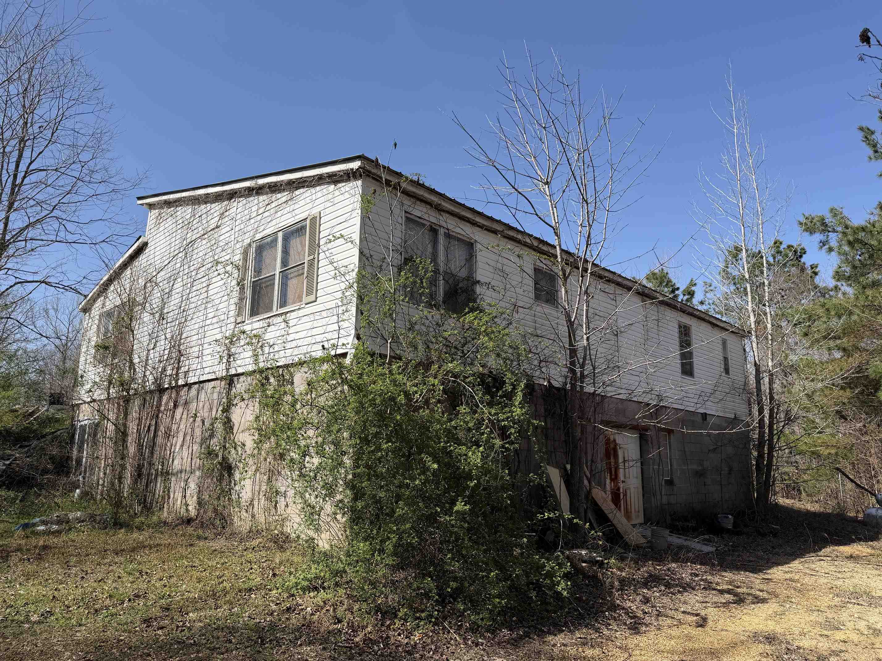 5085 Hardin Graveyard Road Enville, TN 38332 - Photo 30 of 40 a view of a house with a yard
