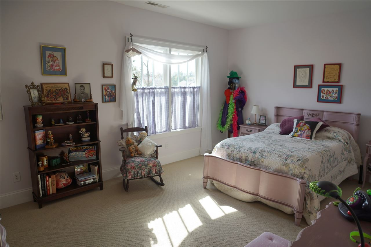 607 Competition Road Raleigh, NC 27603 - Photo 19 of 20 Other upstairs bedroom, also with WIC, and direct entry to bathroom