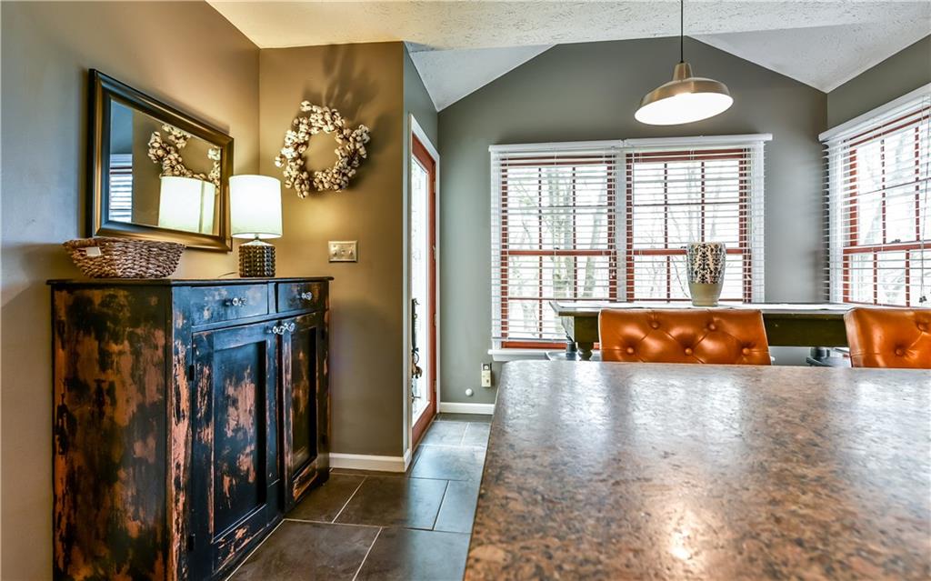 3844 Grove Road Gibsonia, PA 15044 - Photo 16 of 25 Great shot of the honed granite countertops and vaulted ceiling in the breakfast area.