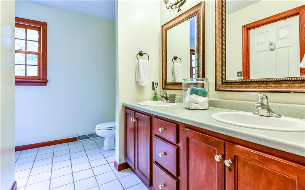 3844 Grove Road Gibsonia, PA 15044 - Photo 19 of 25 Master bath with dual vanity, updated lighting and mirrors.