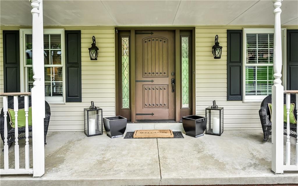 3844 Grove Road Gibsonia, PA 15044 - Photo 3 of 25 Gorgeous new Pella door, exterior lighting and recently painted shutters.