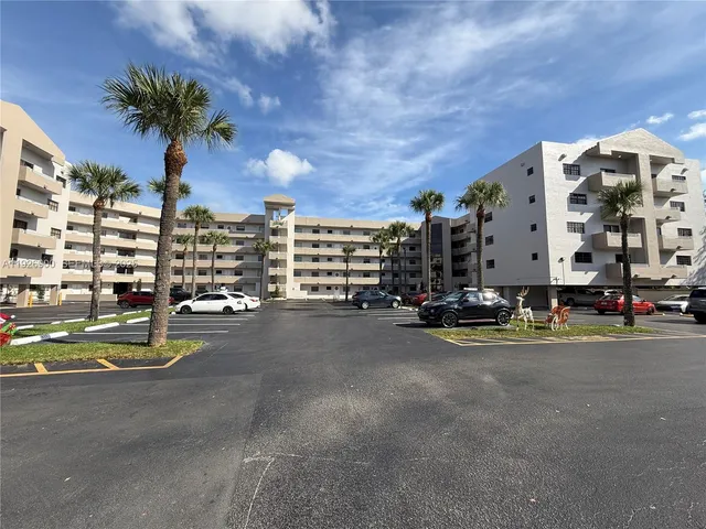 a view of a street with cars