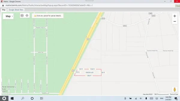 a view of backyard with green space