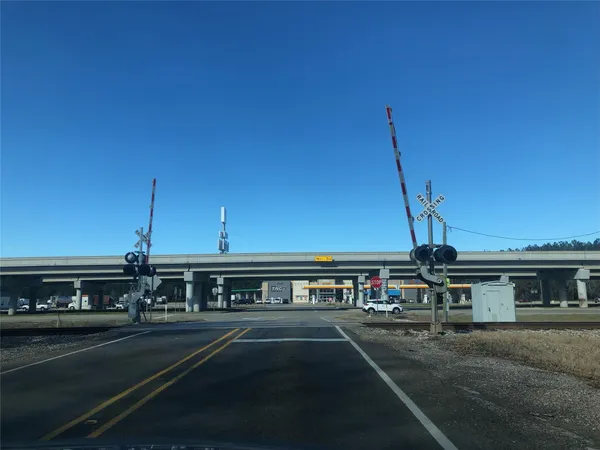 a sign on a pole on a street