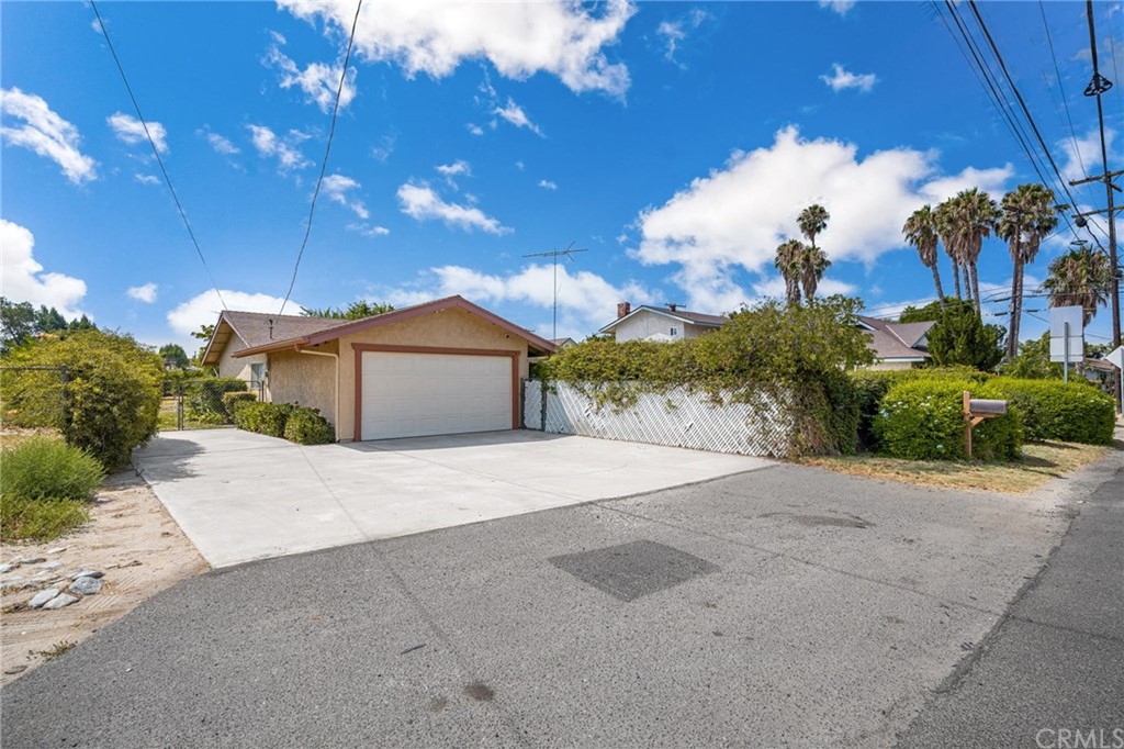 10778 Wells Avenue Riverside, CA 92505 - Photo 1 of 1 a front view of a house with a yard and outdoor seating