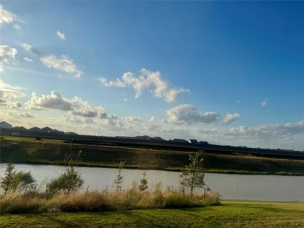 a view of swimming pool from a lake