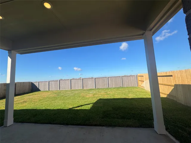 a view of a big room with a big yard