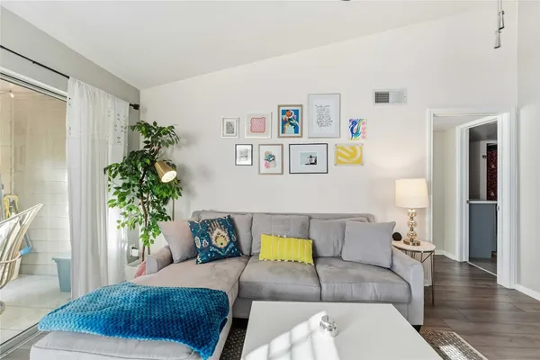 a living room with furniture and a couch