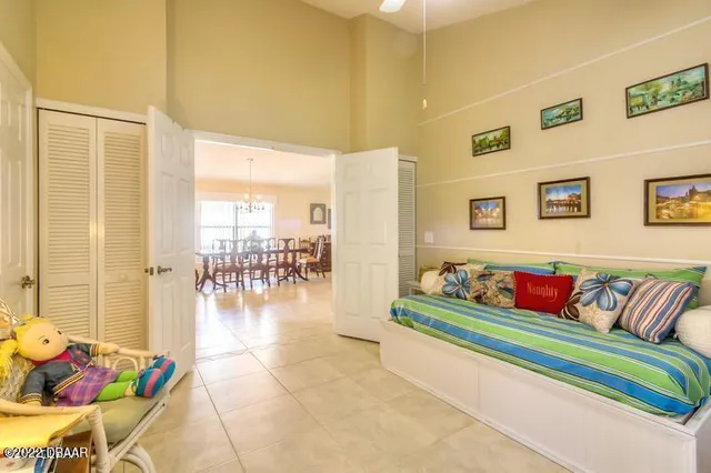 a reading room with furniture and wooden floor