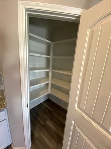 a refrigerator freezer sitting inside of a kitchen