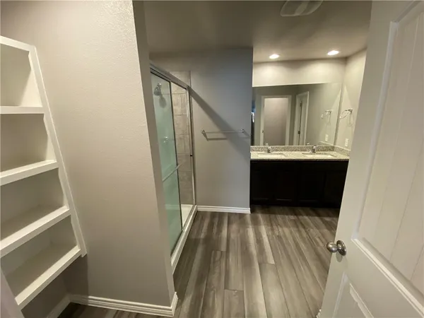 a view of entryway with wooden floor