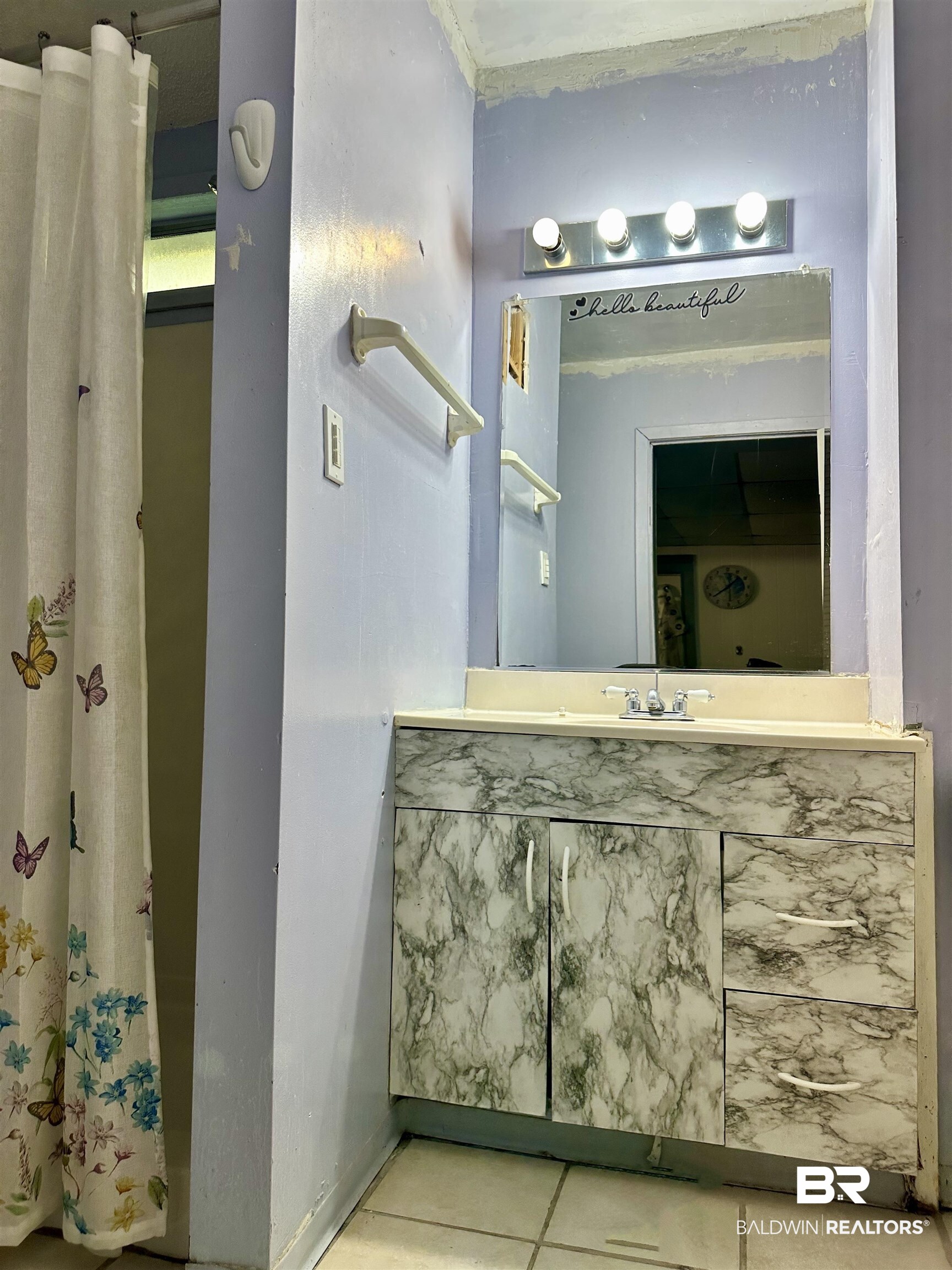 1206 St Nicholas Avenue Brewton, AL 36426 - Photo 12 of 19 Bathroom with vanity and tile patterned flooring