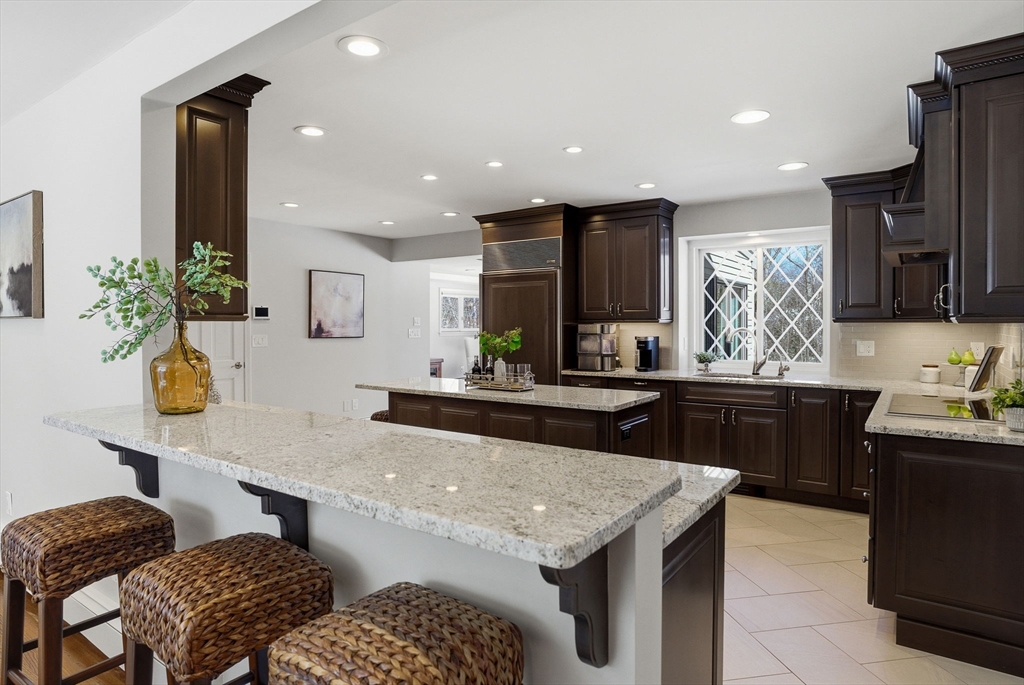 10 Bridle Path North Andover, MA 01845 - Photo 11 of 42 a kitchen with granite countertop lots of counter top space