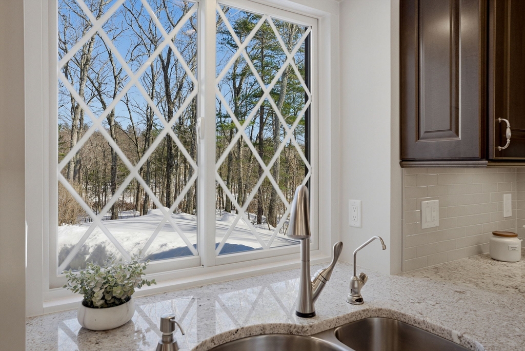 10 Bridle Path North Andover, MA 01845 - Photo 14 of 42 a bathroom with a sink and a mirror