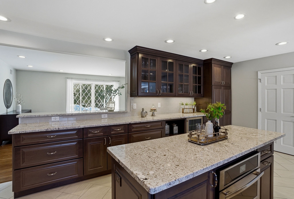 10 Bridle Path North Andover, MA 01845 - Photo 15 of 42 a kitchen with a counter space a sink and cabinets