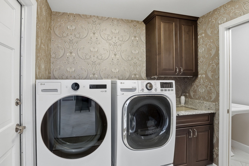 10 Bridle Path North Andover, MA 01845 - Photo 18 of 42 a utility room with dryer and washer