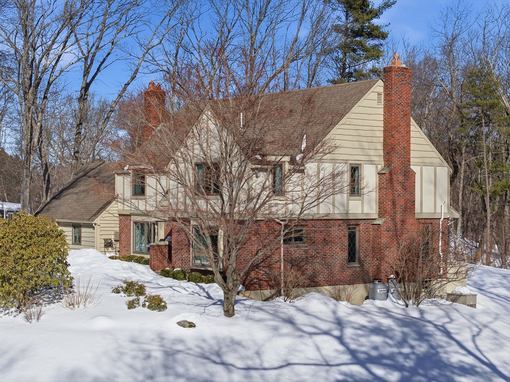10 Bridle Path North Andover, MA 01845 - Photo 2 of 42 a view of a house with a snow in the yard