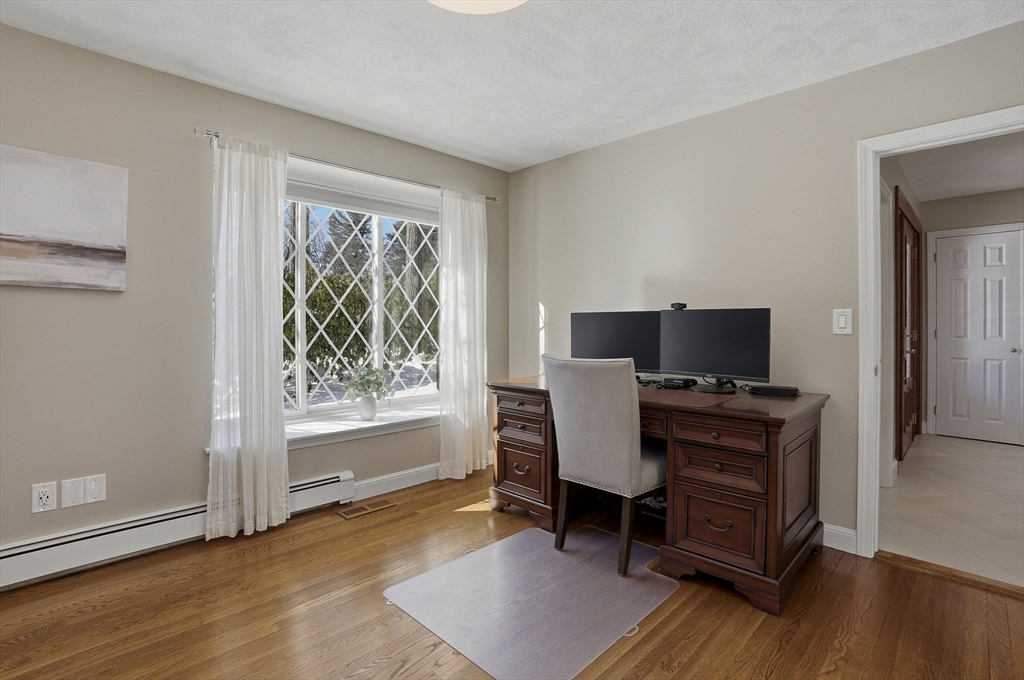 10 Bridle Path North Andover, MA 01845 - Photo 25 of 42 a view of a workspace with furniture and a window