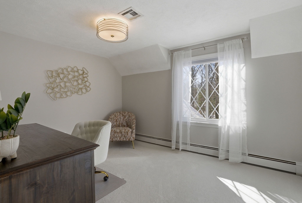 10 Bridle Path North Andover, MA 01845 - Photo 33 of 42 a view of room with window and wooden floor