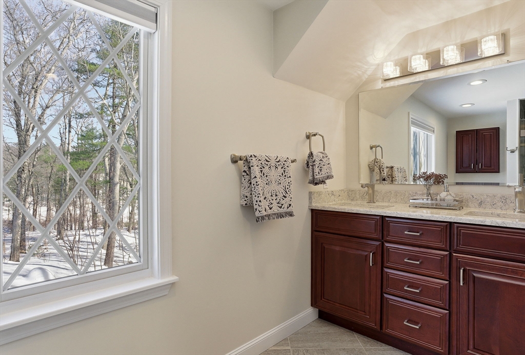 10 Bridle Path North Andover, MA 01845 - Photo 39 of 42 a bathroom with a granite countertop sink and a mirror
